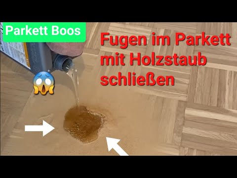 So schließen Sie die Fugen im Parkett mit Fugenkitt aus Holzstaub