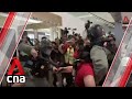 Riot police and protesters clash in Sheung Shui shopping mall