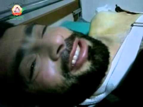 إسعاف أحد عناصر كتيبة الصفوة الإسلامية بعد اصابته على احدى الجبهات في ريف حلب