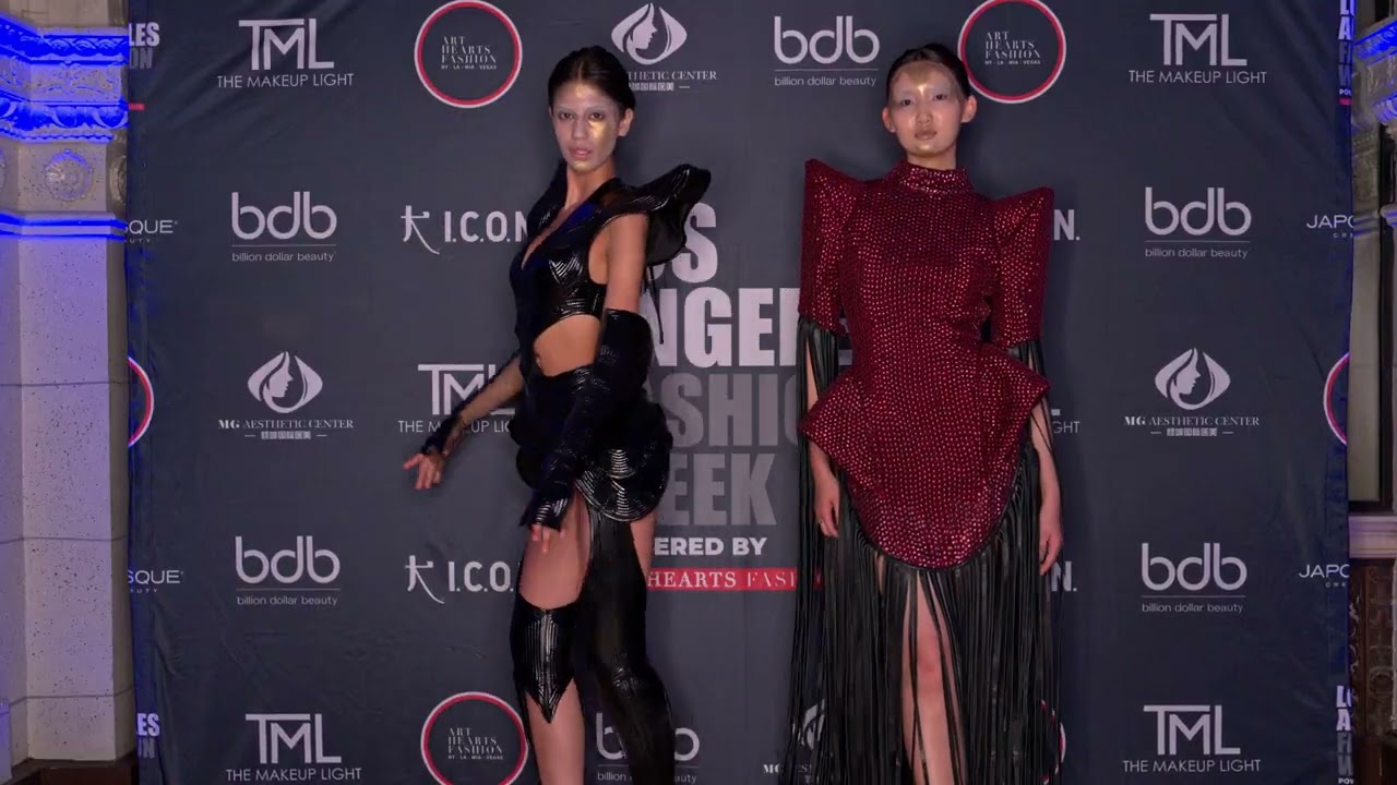 Models Melanie and Shayna pose with Ava Cherlyn at Artheartsfashion LAFW