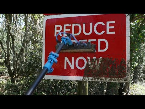 Man becomes viral sensation for cleaning signs