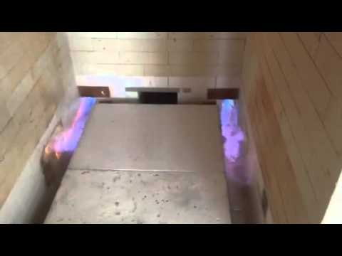 Gas kiln with burners on full