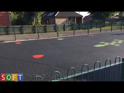 Black Wetpour Playground with Graphics in Canterbury, Kent | Wet Pour Installation
