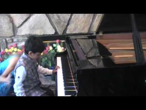 Amogh 6,  solfeges while playing Happy Birthday