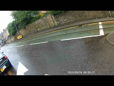 Cycling Plus Tram Tracks in the Wet in Sheffield