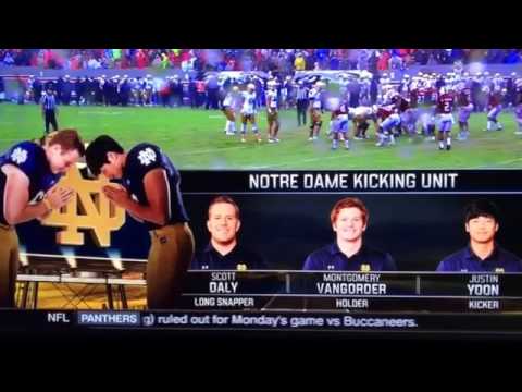 2017 NFL Prospect Scott Daly snapping laces out in a hurricane