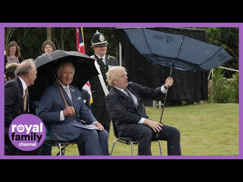 Prince Charles Giggles as Boris Johnson Battles Umbrella