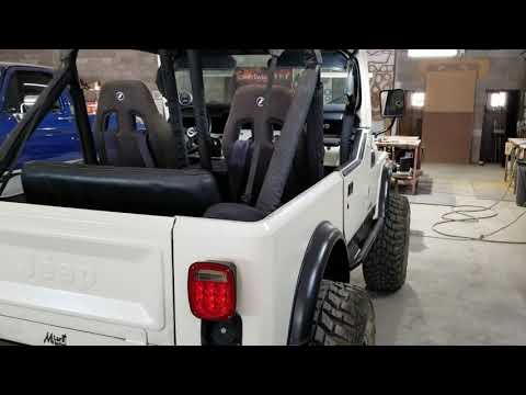 85 CJ7 custom sound system and custom door panels center console and rear speaker pods