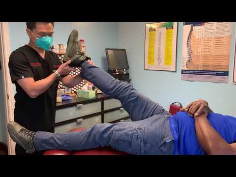 BLACK BELT Chiropractor giving Full Body Adjustment using Applied Kinesiology Technique.