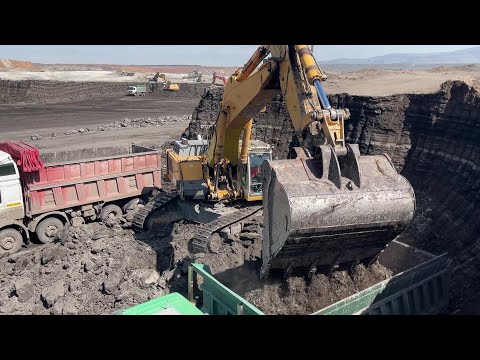 Liebherr 964 Excavator Loading Mercedes And MAN Trucks