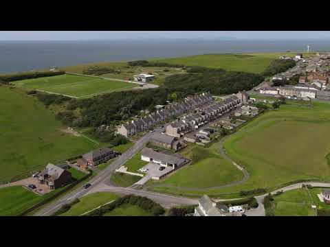 Lowca in 1929 and 2020.