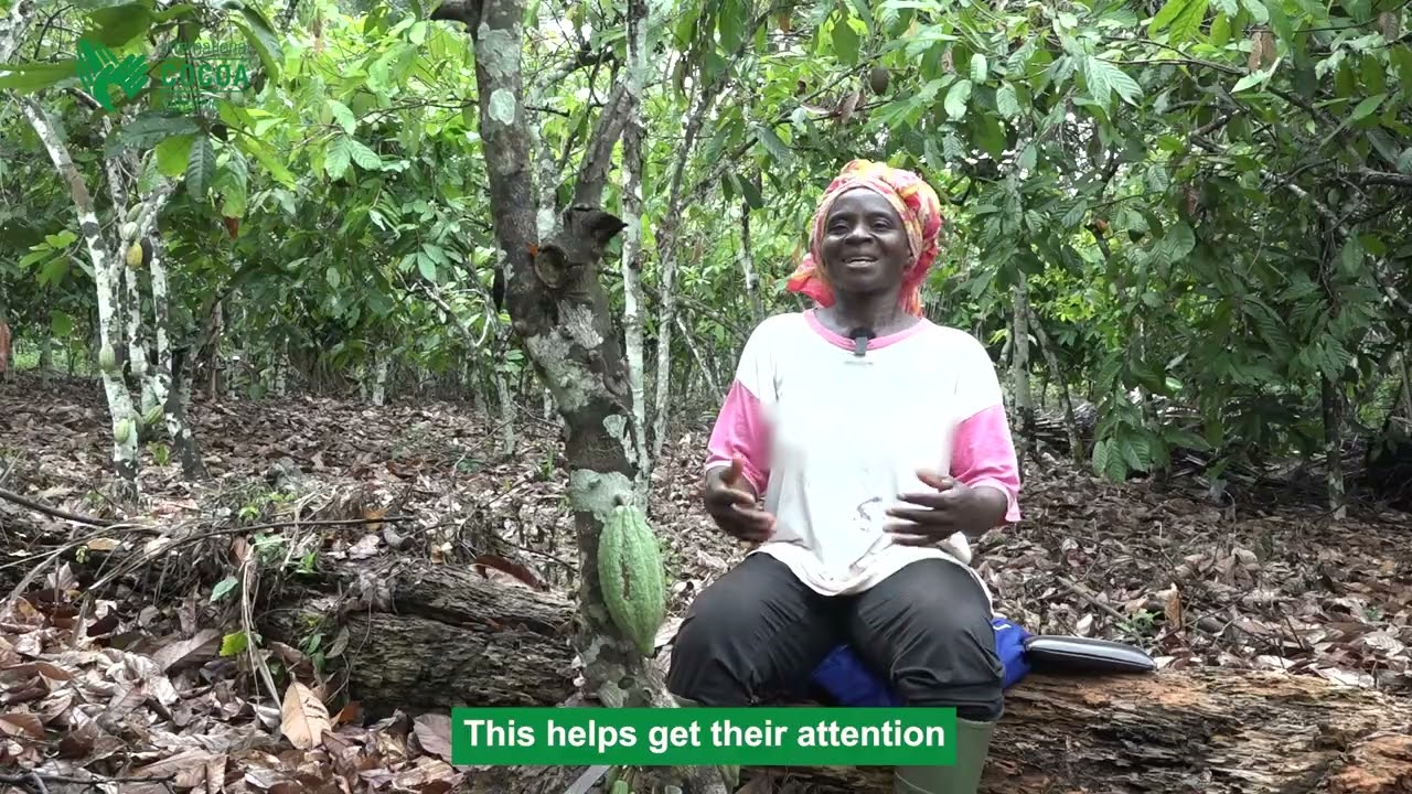 Community facilitator Yvonne explains how she works with families to raise awareness on child labour