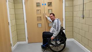 How to open doors in a wheelchair