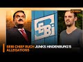 sebi chief buch junks hindenburg s allegations dd india