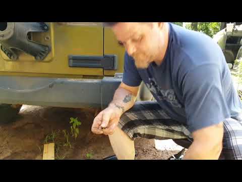 Repairing Jeep Wrangler tailgate hinges.