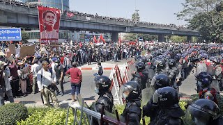 video: Myanmar: Woman fighting for her life after live rounds fired at protesters rallying against coup