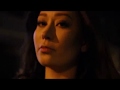 Asian Girl Walking Through Streets Looking At Camera Free Stock Footage