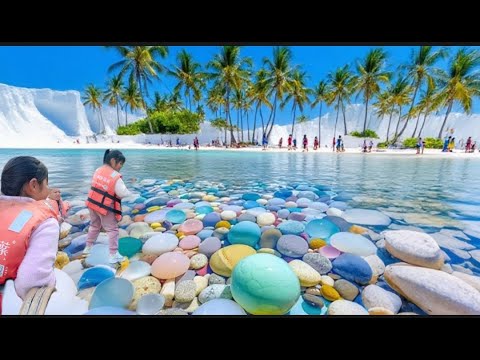 Emerald pearl sea snails are found in large numbers on the beach. Egg-shaped agate，Sea Crystal