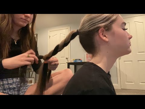 sister tries ASMR for the first time (hair brushing, braiding, & scratching)