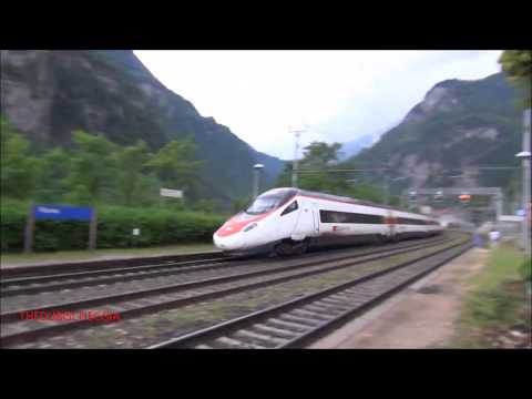 LA STROMBAZZATA DEL MERCI E DELL' EUROCITY A ISELLE E VARZO. (VB) DOM. 22 - 6 - 2014.