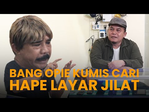 Opie Kumis Searches for a Cellphone with Licking Screen Technology at Denny Chandra's Cellphone C...