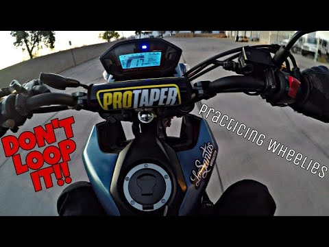 Practicing Grom wheelie balance point again, during sun down.