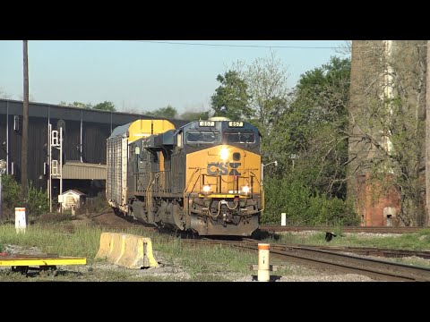 CSX 857 leads I025-29 through Cordele, GA w/PTC blowing the horn. 03/30/23.