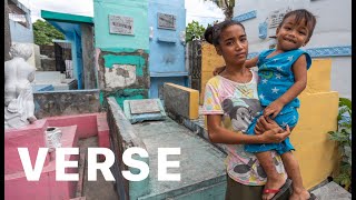 Born in a cemetery, how this girl survives living among the dead.