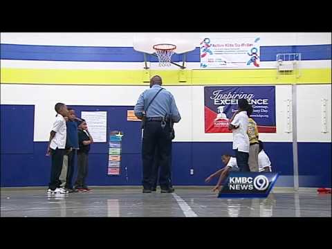 Police use doughnuts, hoops to mentor kids