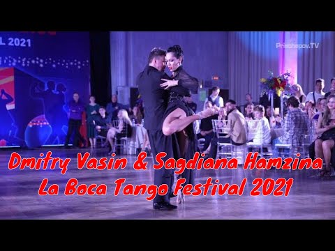  Dmitry Vasin  and  Sagdiana Hamzina  are  dancing  to  the  tango  "  Los Mareados  "  by  Solo Tango Orquesta  at  La Boca Tango Festival  in  2021