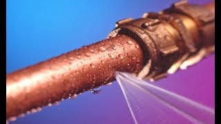 How to join two pieces of copper pipe using a compression coupling.