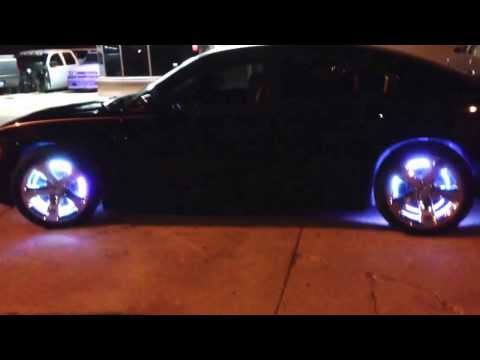 Custom rgb led wheel light kit and led lighting in the grille dodge Charger.