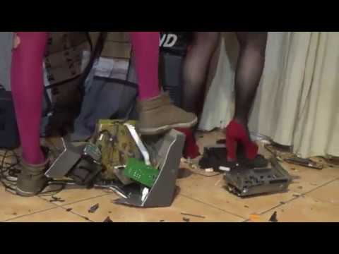 Crushing and destruction of a hi-fi system in high heels and basketball