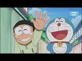 DORAEMON MALAY PATUNG BERJAMI BERHANTU
