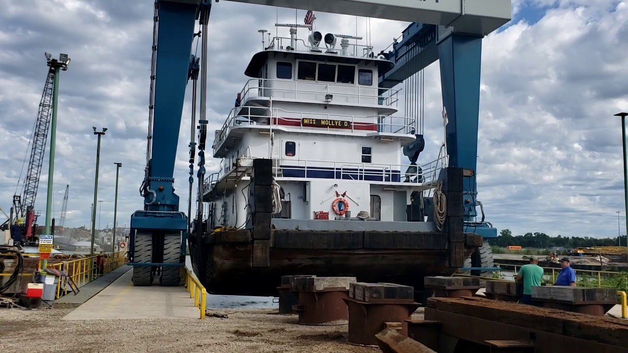 tugboat lifted out of water.