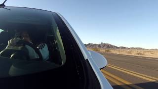 preview picture of video 'Foothills, AZ drive north to U.S. Route 95 Highway, Outdoor Hippie Split Screen Rear Looking View'