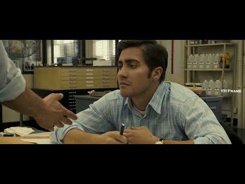 Zodiac trailer frame of newsroom windows at dusk matching the film’s procedural tone