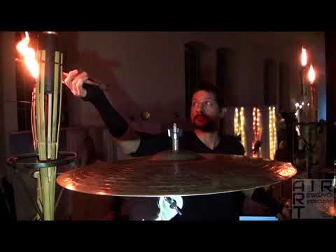 Mystical drum show with fiery sticks