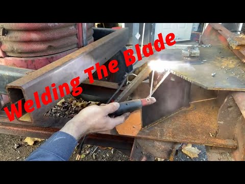 Working On The Front Dozer Blade On the Massey 50