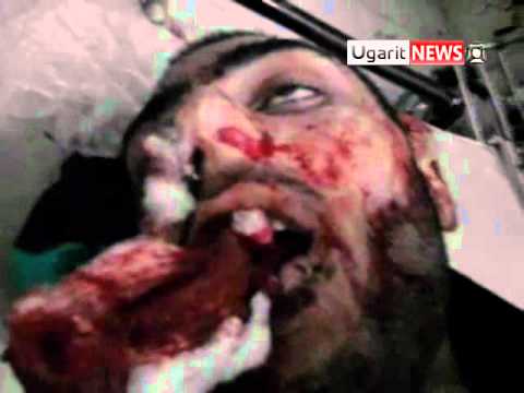 جثمان هادي الجندي الذي قتل على يد الامن في جمعة لا للحوار في مدينة حمص في محافظة حمص