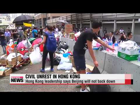 Hong Kong protests continues for universal suffrage   홍콩 시위 확산...주요 기능 사실상 마비
