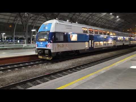 Prague Main Railway Station in the evening: interior, Fanta's Café and exterior