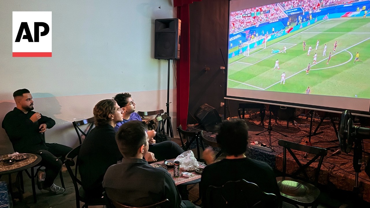 Video | Fans watch Iran's first World Cup match at a coffee shop in Tehran