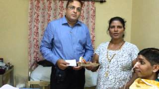 Avalon handing over Rs 56,878/- to Wilson's mother
