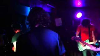 Sean Kennerly of samiam plays air guitar for casting out wh