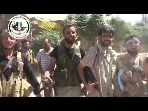 فرحة عناصر الجيش الحر بعد السيطرة على حي الحويقة في مدينة دير الزور