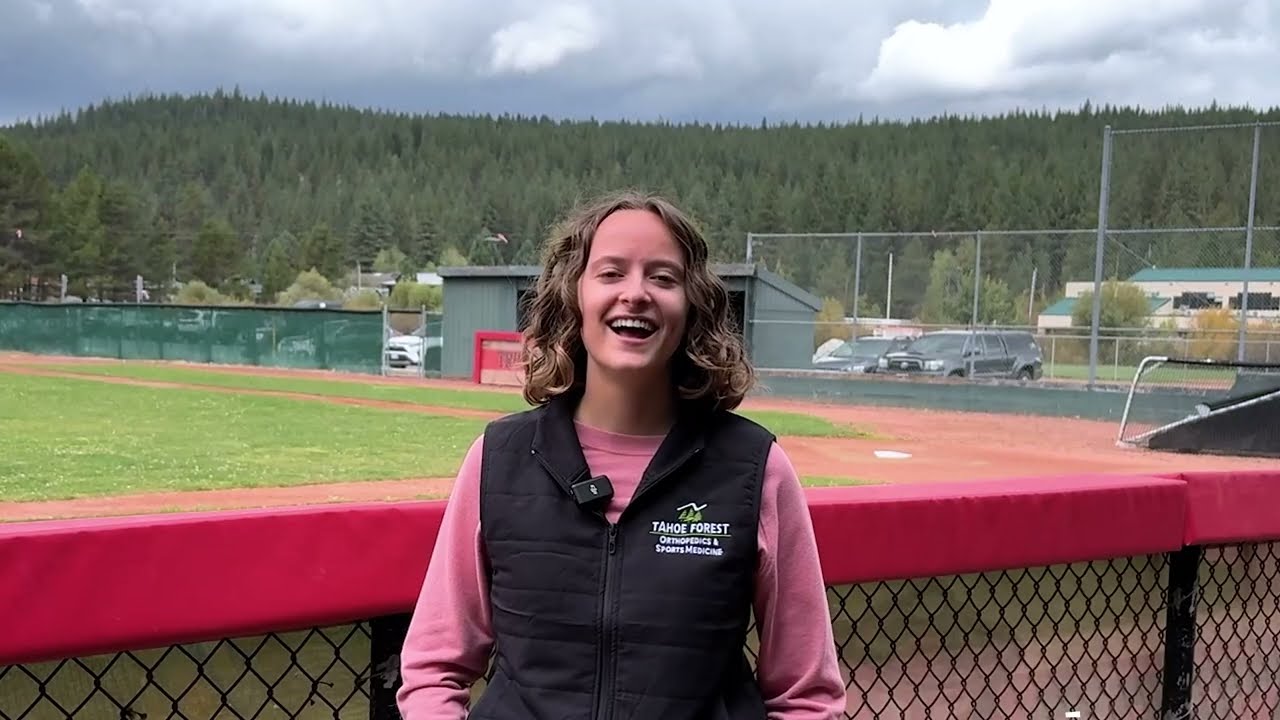 Molly Sitter, athletic trainer at Tahoe Forest Health System, standing in front of a ballpark