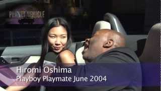 Playboy Playmate Hiromi Oshima with the 2014 Jaguar F-Type