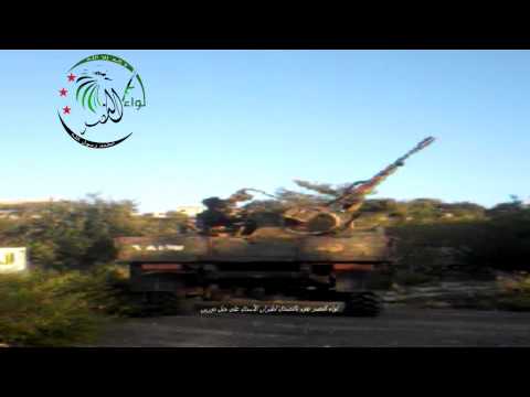 التصدي للطيران الحربي بالرشاشات الثقيلة من قبل ولواء النصر على جبل دورين في ريف اللاذقية