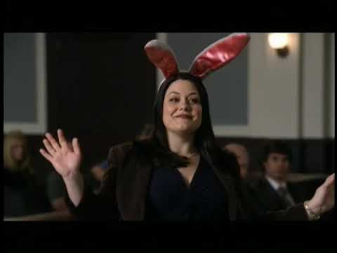 Trailer frame: Jane and Grayson cross in the hallway as a cue swells